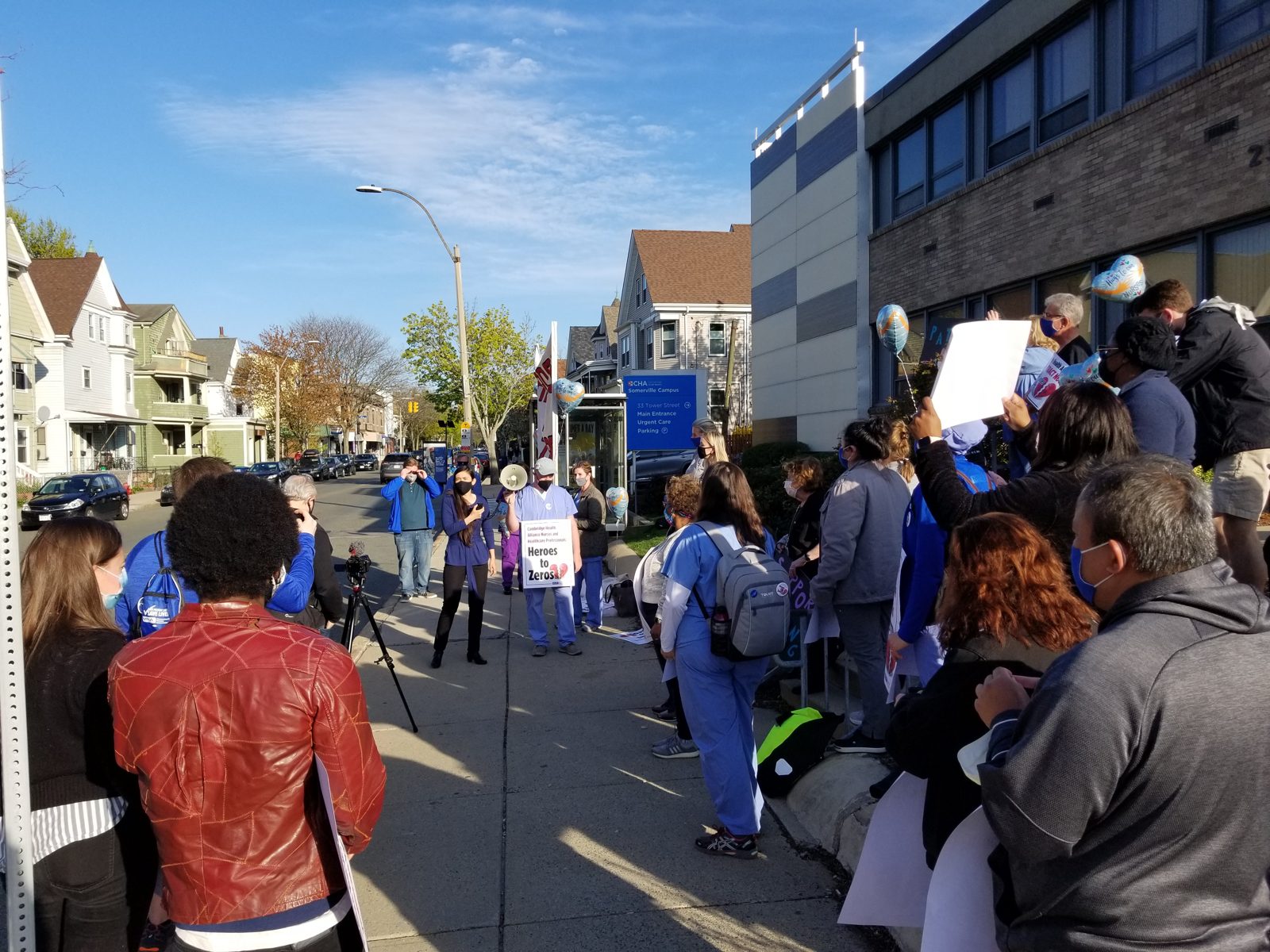 Erika standing with nurses at a Cambridge Health Alliance rally